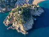Swim With the Sirenes Around The 'Cap de Tossa' Lighthouse
